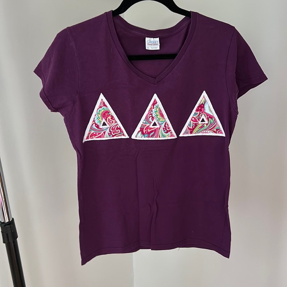Size medium tri delta v neck letters